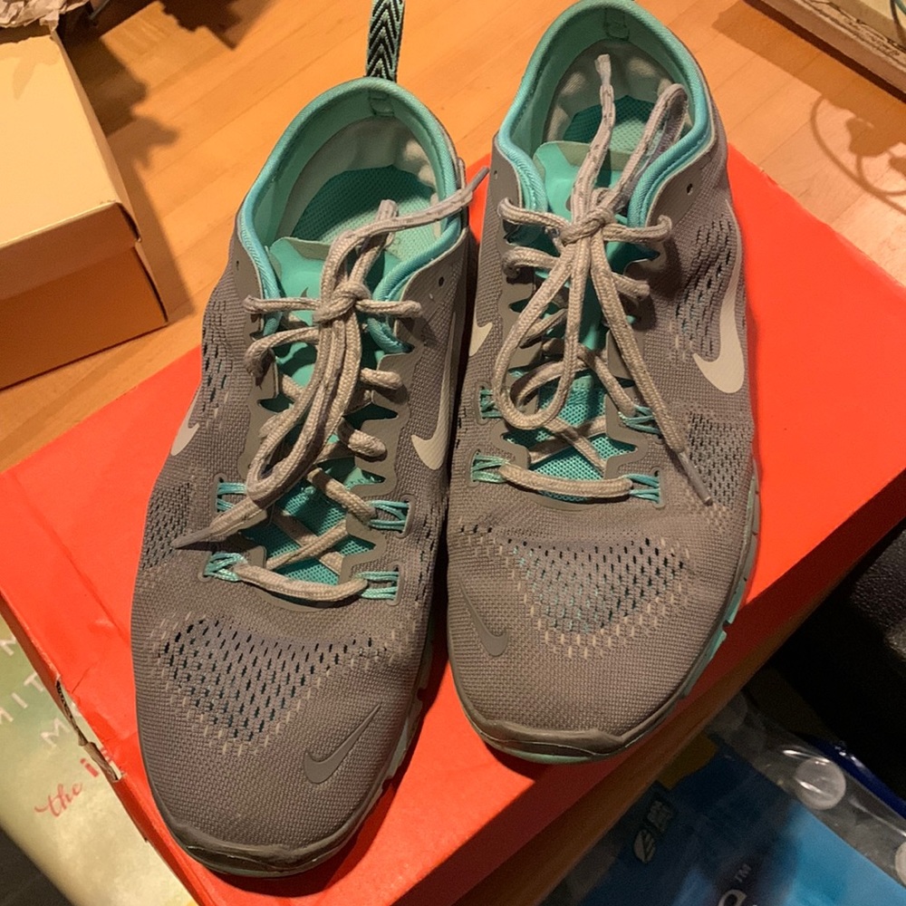 Grey and teal Nike Free 5.0